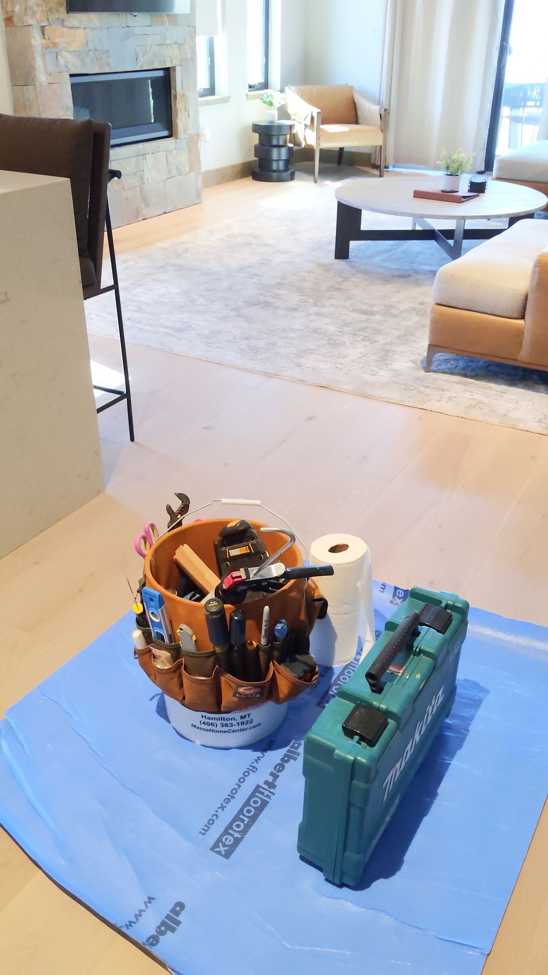 clean handyman with floor protection to protect home in luxury vacation rental 